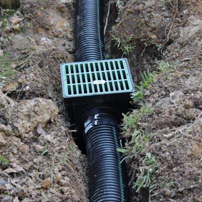 A photo of a Budget Drains Nottingham Drainage engineer unblocking a toilet with a jetter.