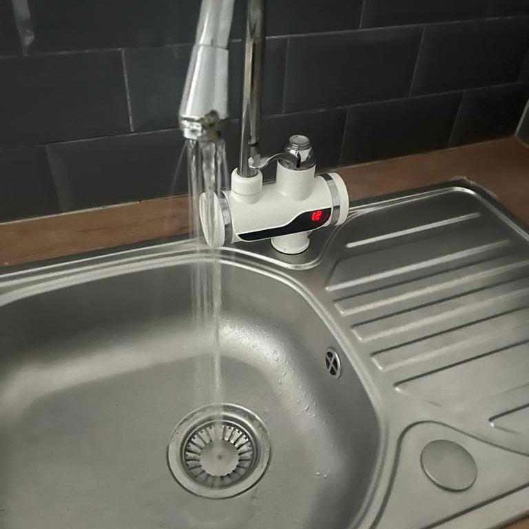 A photo of a clean running sink that was unblocked and cleaned by Budget Drains Nottingham.