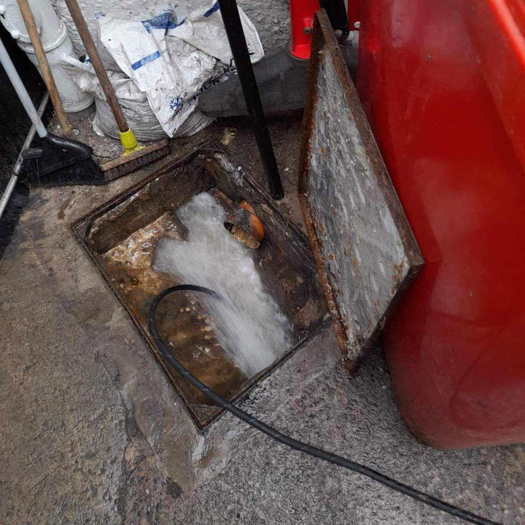 a photo of a drain being unblocked in a emergency drain unblocking call.